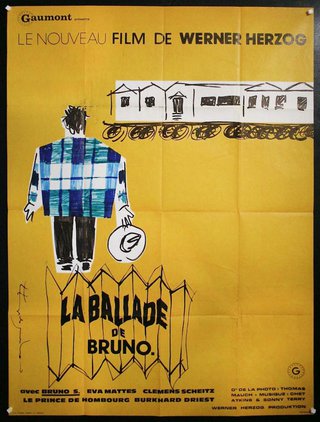 a yellow poster with a man and a train