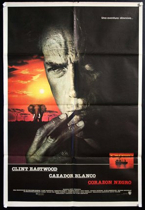 a movie poster of a man smoking a cigarette