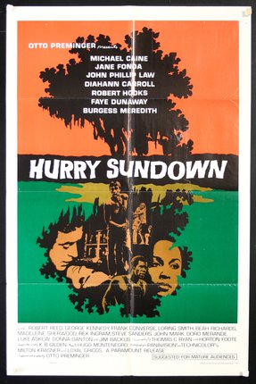a movie poster with a tree and people