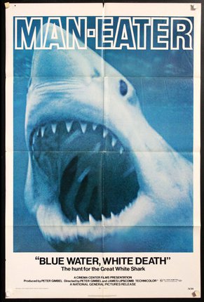 a poster with a shark's mouth open