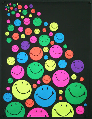 a group of colorful smiley faces in bright colors