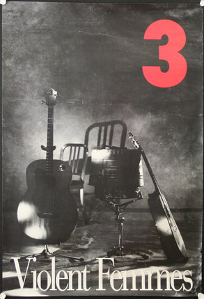 a poster with a guitar and chair