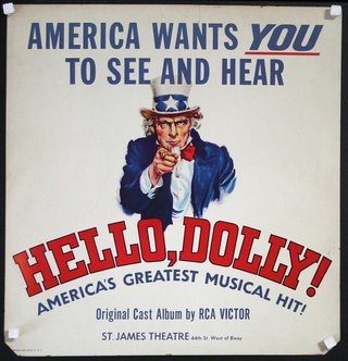 a poster with a man pointing at the camera