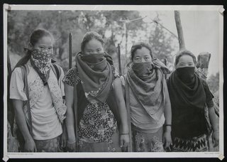 a group of women wearing scarves