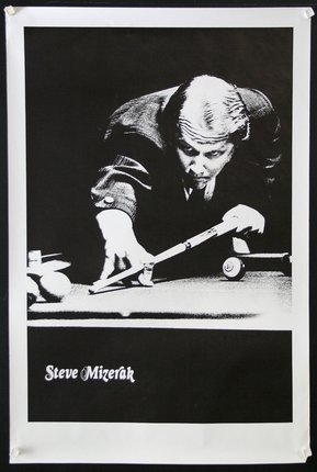 a man holding a pool cue