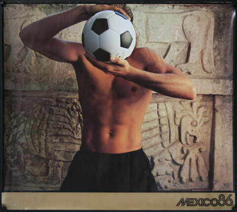 a man holding a football ball