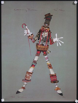 a puppet made of spools and spools