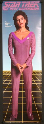 a woman in a pink jumpsuit
