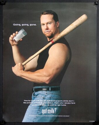 a man holding a baseball bat