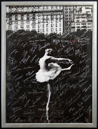 a framed photo of a ballerina