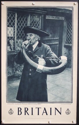 a man in a hat holding a horn