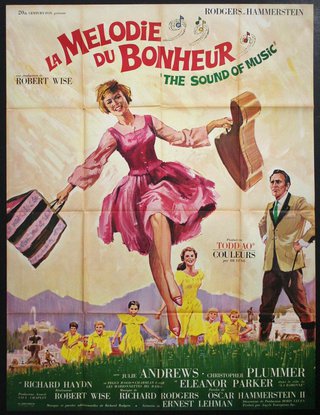 a movie poster of a woman running with a bag and a man in a suit