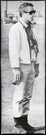 a man wearing a white jacket and white pants