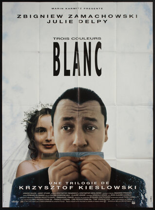 movie poster with a cloudy backdrop and a man playing a comb harmonica with a bride behind him looking over his shoulder