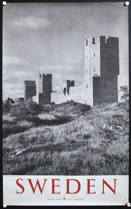 a stone castle with towers