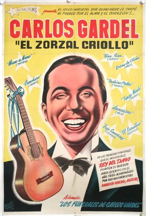 a poster of a man smiling with a guitar