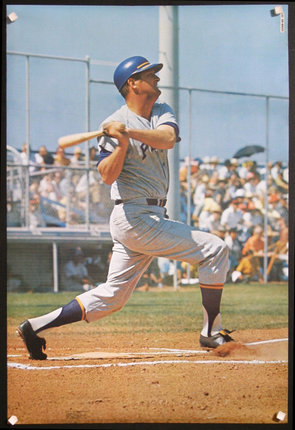 a baseball player swinging a bat