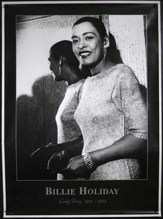 a woman smiling in a black and white photo