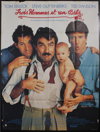 a trio of men with a baby