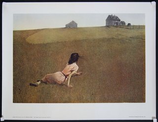 a woman lying in a field
