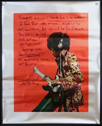 a poster of a man playing a guitar