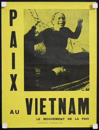 a yellow and black poster with a woman waving