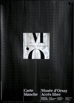 a black perforated surface with a silver square with a black and white logo