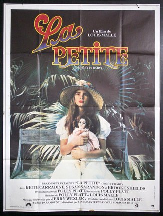 a movie poster of a woman holding a doll
