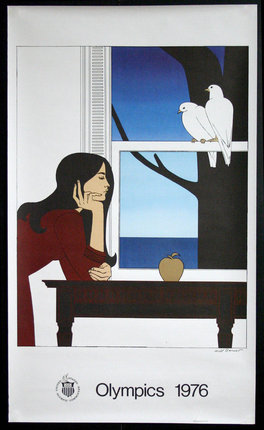 a woman sitting at a table looking out a window