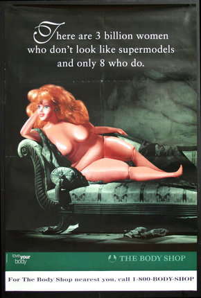 a poster of a woman lying on a couch