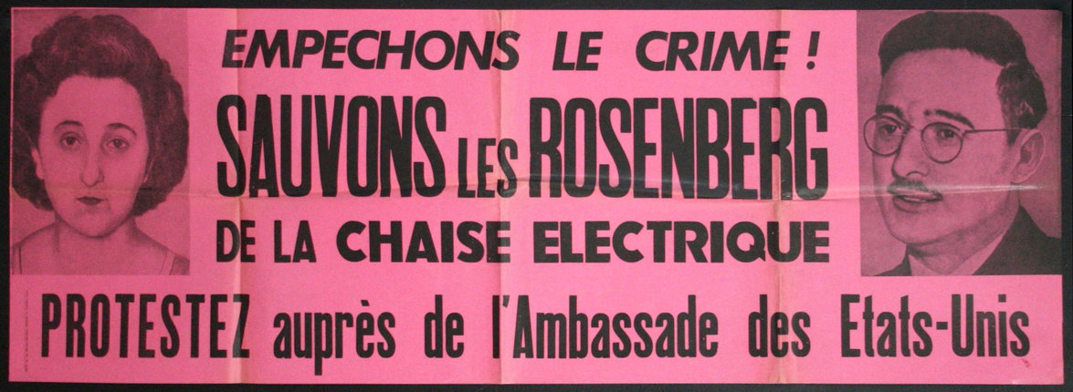 a pink sign with black text