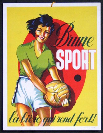 a woman holding a football ball