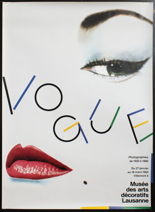 a poster with a woman's face in heavy makeup and lipstick