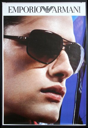 a close-up of a man wearing sunglasses