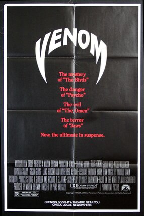 a movie poster with red text