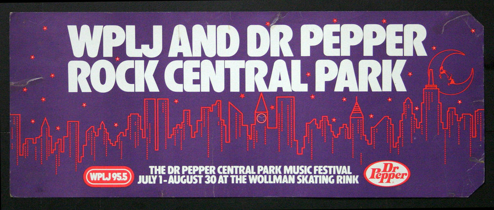 a purple sign with white text and city silhouettes
