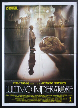 a movie poster of a boy on a floor