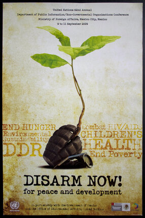 a poster with a plant growing out of a grenade
