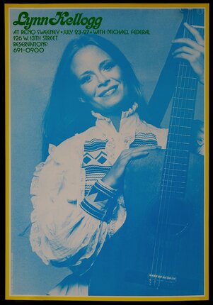 a woman holding a guitar