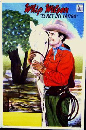 a man in a cowboy hat holding a horse