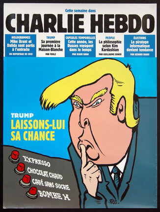 a poster of a man with a finger on his mouth