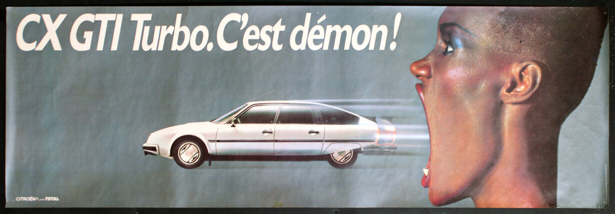a poster of a car with a rocket shaped exhaust pipe