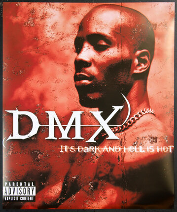 a man with a chain around his neck