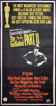 a movie poster with a man in a suit and hat
