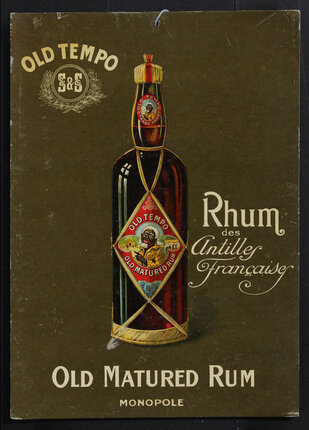 a bottle of liquor on a green background