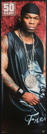 a man wearing a black tank top and a necklace