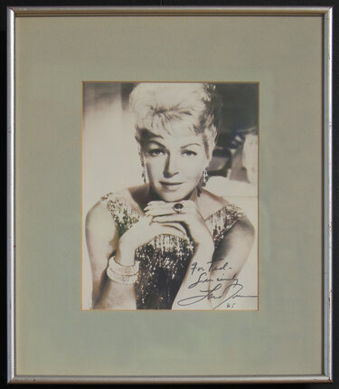 a framed photo of a woman