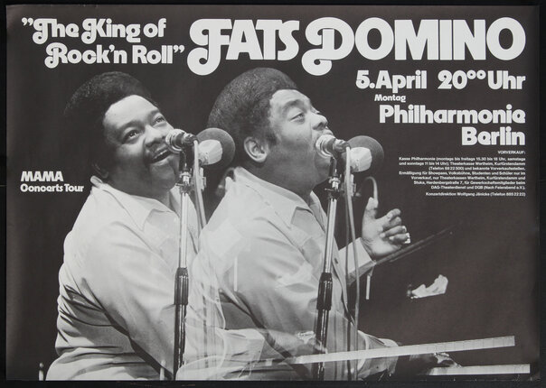 a black and white poster of men singing into microphones