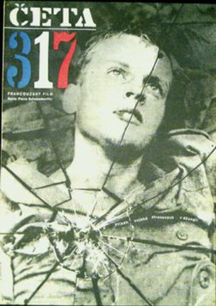 a magazine cover with a man in a broken glass
