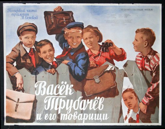 a group of boys holding briefcases